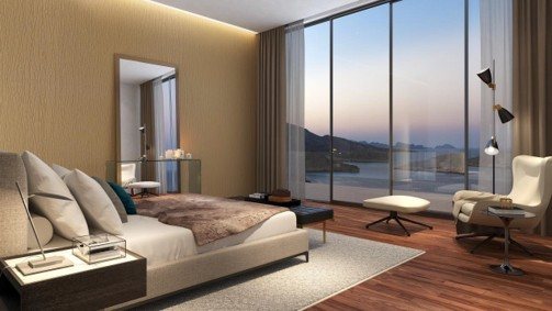 Bedroom — lagoon & mountain views at dusk