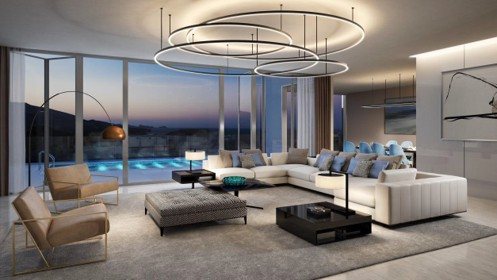 Living room at dusk — pool terrace beyond