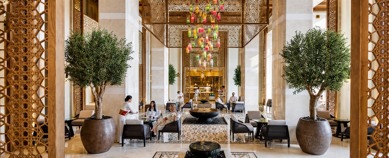 Lobby lounge — Murano glass chandeliers & carved timber columns