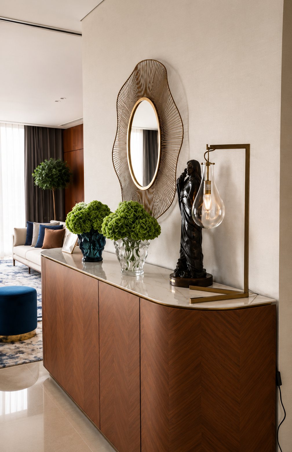 Foyer console — sculptural mirror & herringbone walnut