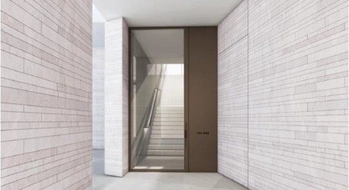 Entry vestibule — bronze portal to the stair